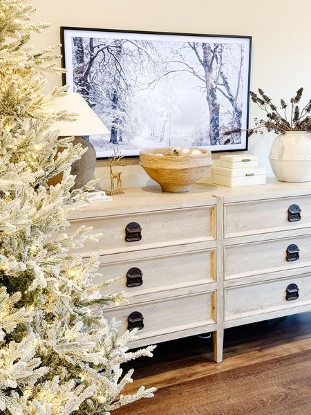 Bedroom dresser styling for the holidays

Frame tv | ceramic vase | McGee & co | 
7. 5’ flocked tree 

#LTKstyletip #LTKHoliday #LTKhome