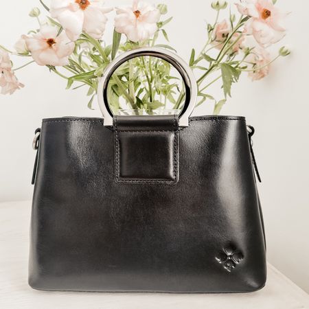 Classy, yet edgy--this leather purse has it all--quality and functionality! 

#LTKstyletip #LTKworkwear #LTKitbag