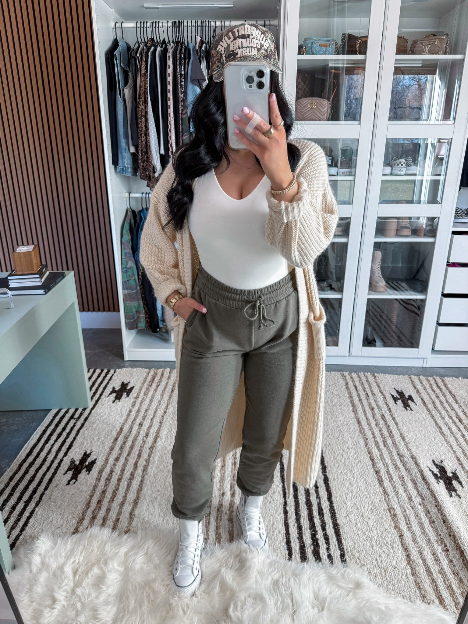 Comfy Outfit of the Day 🤍

Bodysuit - medium (sized up one so I had room for the growing bump, but without the bump I would've done my usual small!)
Cardigan - small
Joggers - small

Love this neutral comfy outfit! It's perfect for those days that you want to look put together, but with little to no effort! 👏🏼 (bonus points because this outfit works with or without a bump!) This cardigan is truly a must have in my opinion! I have it in multiple colors - it's so cozy! I layered it over this basic bodysuit (comes in a ton of color options) & finished the look with these comfy jogger sweatpants, my platform leather converse & a camo hat. 👏🏼



#LTKootd #LTKBump