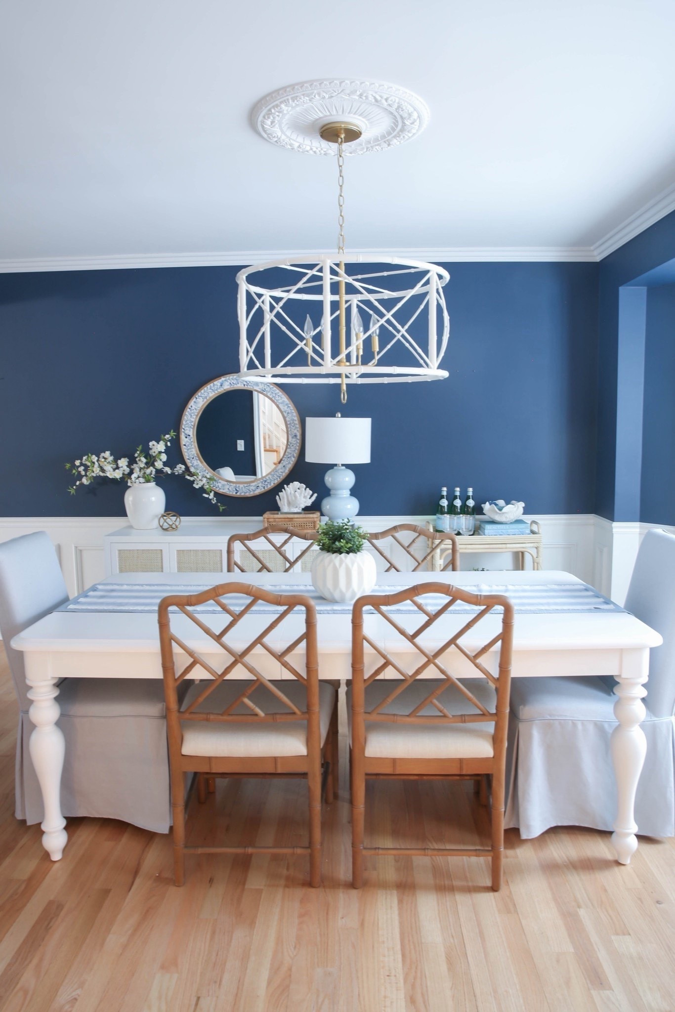 My coastal dining room features a white dining table, blue dining chairs, and blue and white accent pieces for a classic modern coastal look. I love how the crisp white furniture paired with layered blue and white decor makes this space feel bright, airy, and designer-inspired.



#LTKHome #LTKSaleAlert #LTKU
