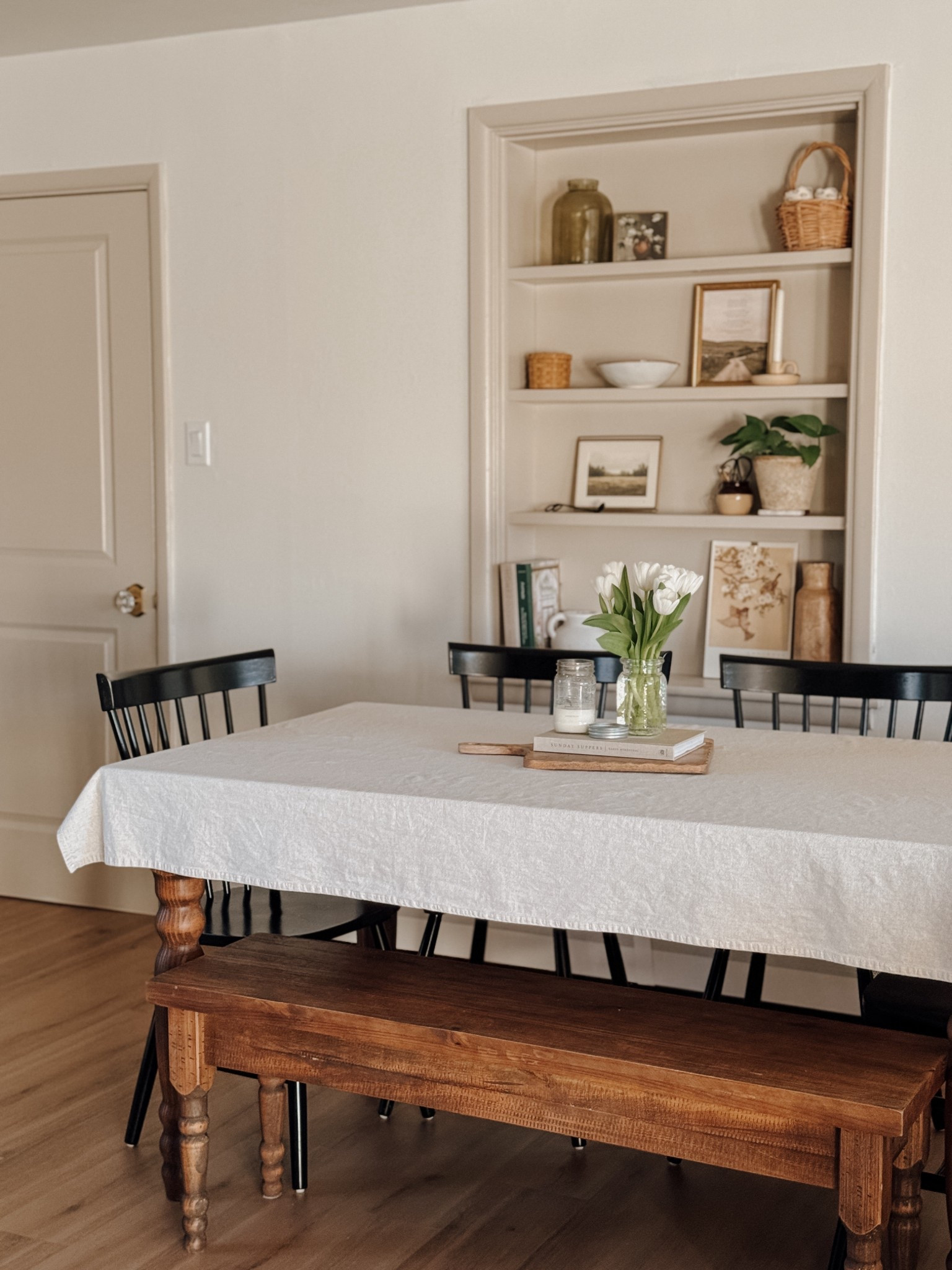 Our cozy little dining space 🤍

our home | dining area | kitchen table | dining table | dining room table | wooden table | wooden bench | linen table cloth | kitchen decor | wall art | kitchen shelves | kitchen shelf decor 

#LTKOver40 #LTKHome