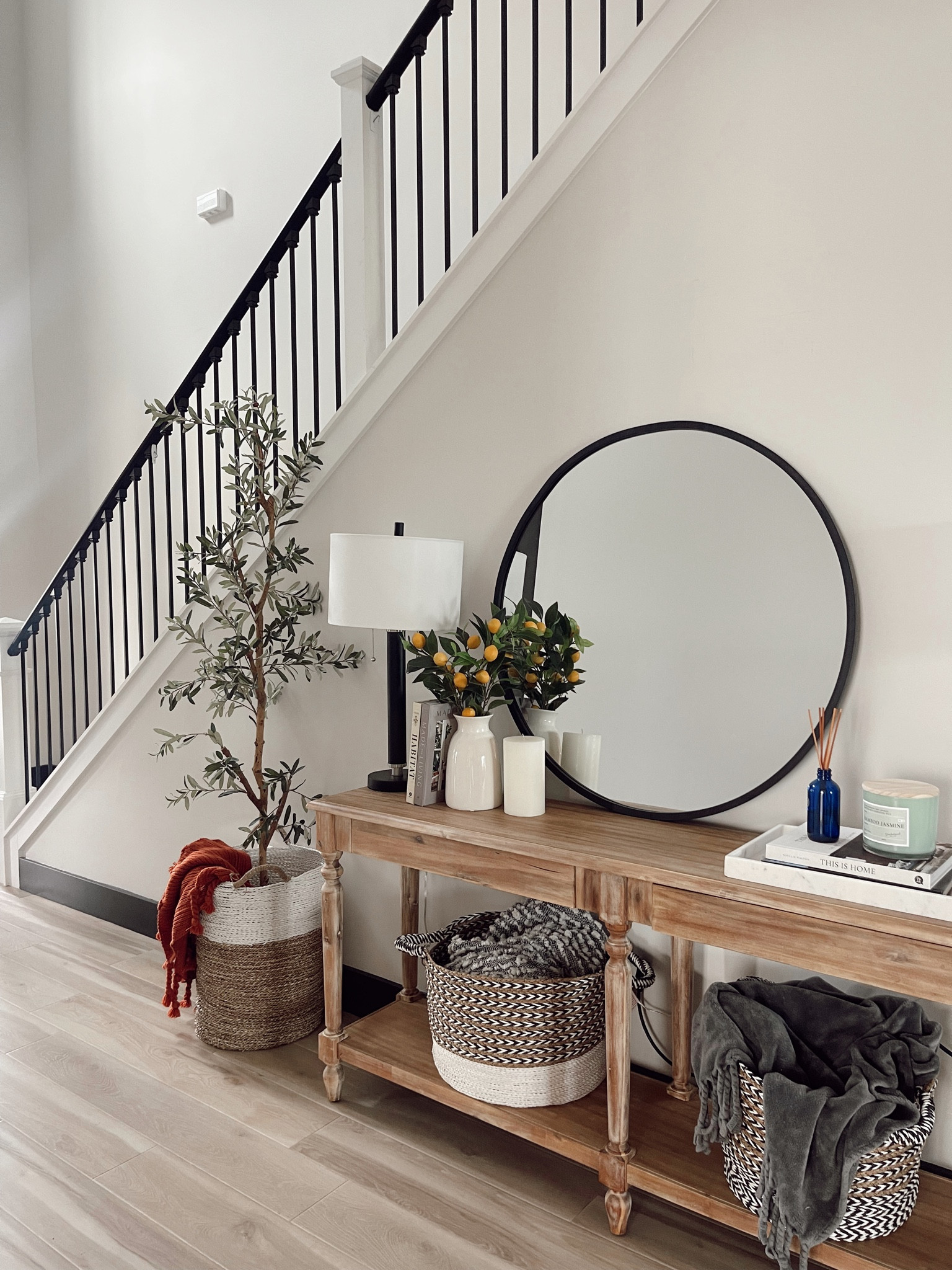 Entry table, mirror, and olive tree are linked! Everything else is from Homegoods! #entrytable #homedecor 

#LTKhome #LTKSeasonal #LTKFind