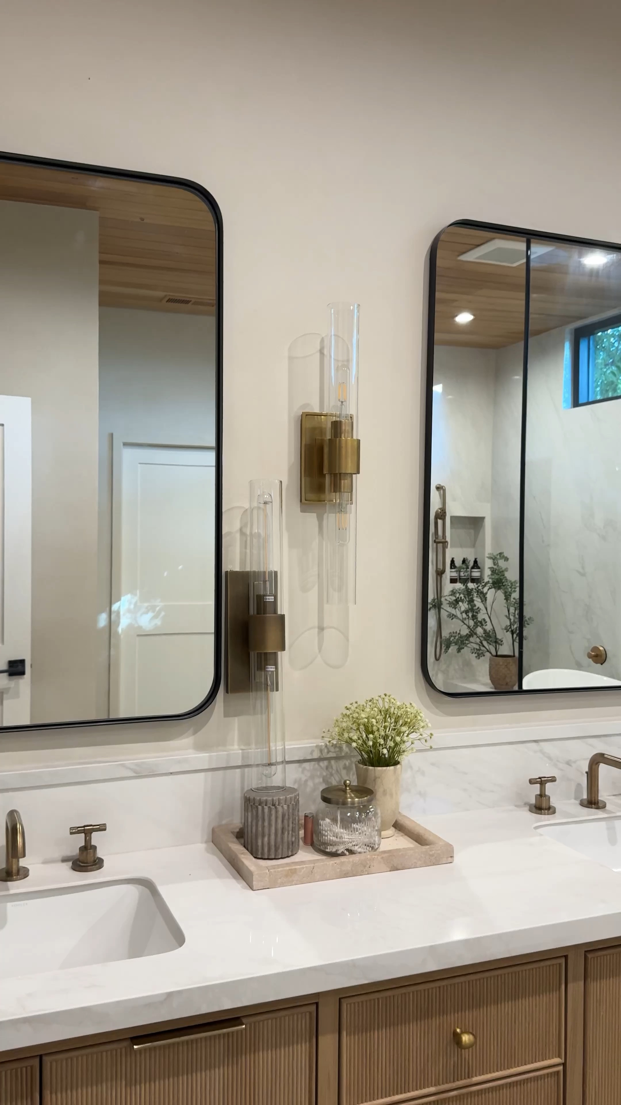 Found identical looking designer look for less sconces for a third of the price I paid for mine! This is 70% off and back in stock! Comes in brass, black and nickel. I love mixing high and low and this mirror is one of my favorite finds.
Looks so high end and comes in 20+ sizes. Also linked affordable tiles to achieve this look

Shop everything here for the Way Day sale. Up to 80% off plus free shipping from 10/5 through 10/7.
You can shop online and in store.
Wood vanity, black rectangle, mirror, brass, sconce, checkered, rug, tub, wood stool, brass hardware, brass faucet, brass shower system brass pulls, brass knob
@wayfair #Wayfairpartner #wayfair #wayday

#LTKHome #LTKFindsUnder100 #LTKSaleAlert