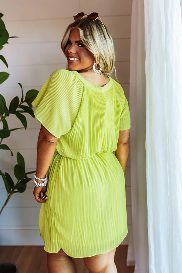 Cool Catina Crush Pleated Dress In Lime Punch Curves | Impressions Online Boutique