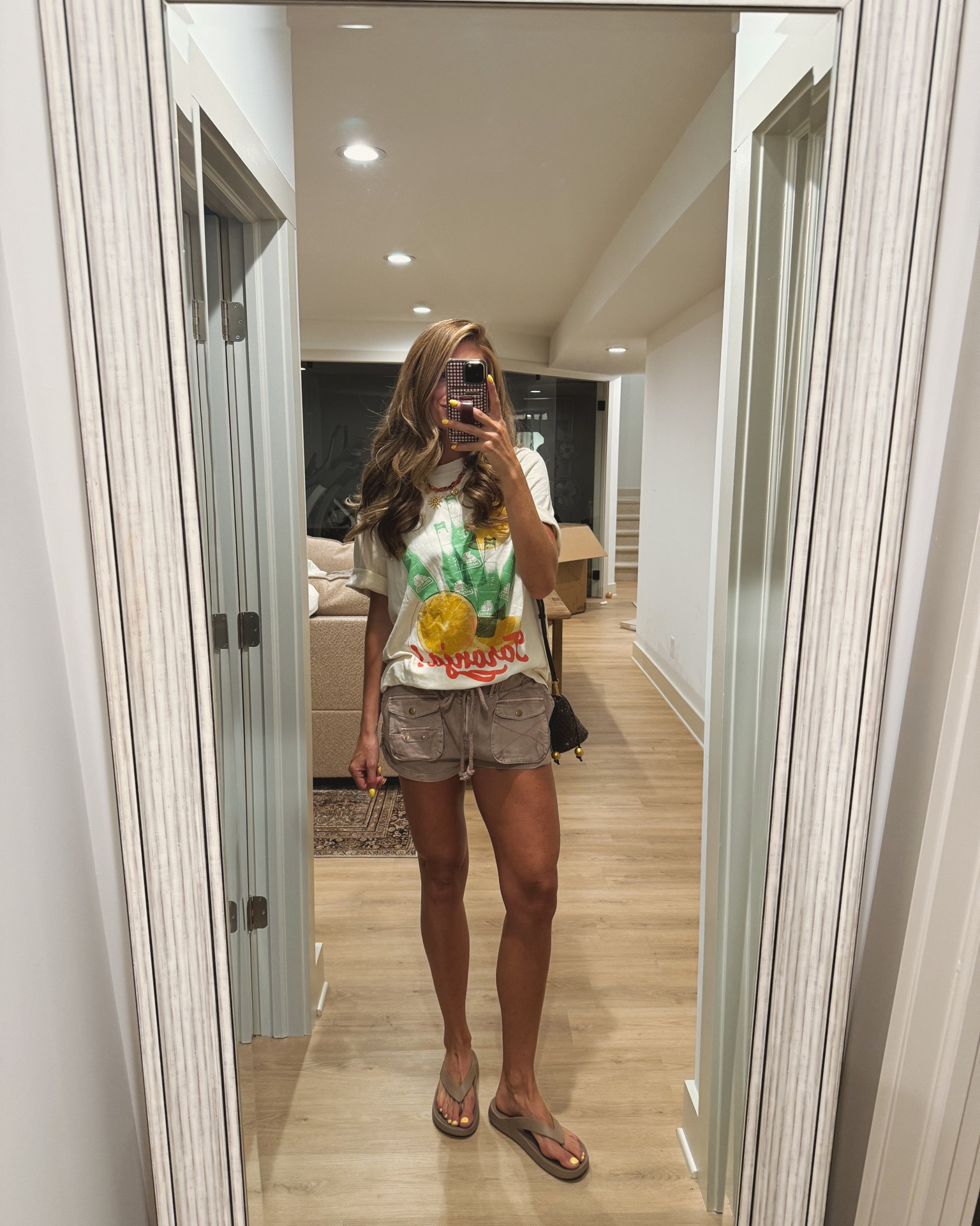 Ally wore today as a toddler mom during the summertime. I love this graphic tea that it comes in tall sizes. I am wearing a size medium tall. It does run very oversized but I like the oversized fit. These shorts are so fun for free people, I have them in other colors and I love wearing them as a cover-up too. They are oversized so I’m wearing a size small keep in mind. They are on the shorter side, but I really breathable for a cover-up and summertime.

#LTKootd #LTKTall