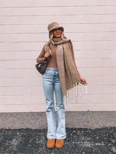 Monochrome Moment! Abercrombie jeans, flare jeans, nude bodysuit, skims, long sleeve bodysuit, uggs, ugg dupes, bucket hat 

#LTKtravel #LTKunder50 #LTKshoecrush