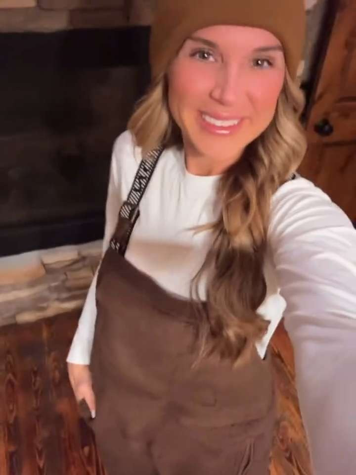 I'm obsessed with these fleece overalls for wearing all winter long. The pocket in the front, and the teddy bear texture jumpsuit is absolute perfection for the perfect outfit for hanging out at the lodge or going snowmobiling. Also linking another hat and similar boots that I love.  

 #LTKdayinmylife #LTKootd #LTKActive