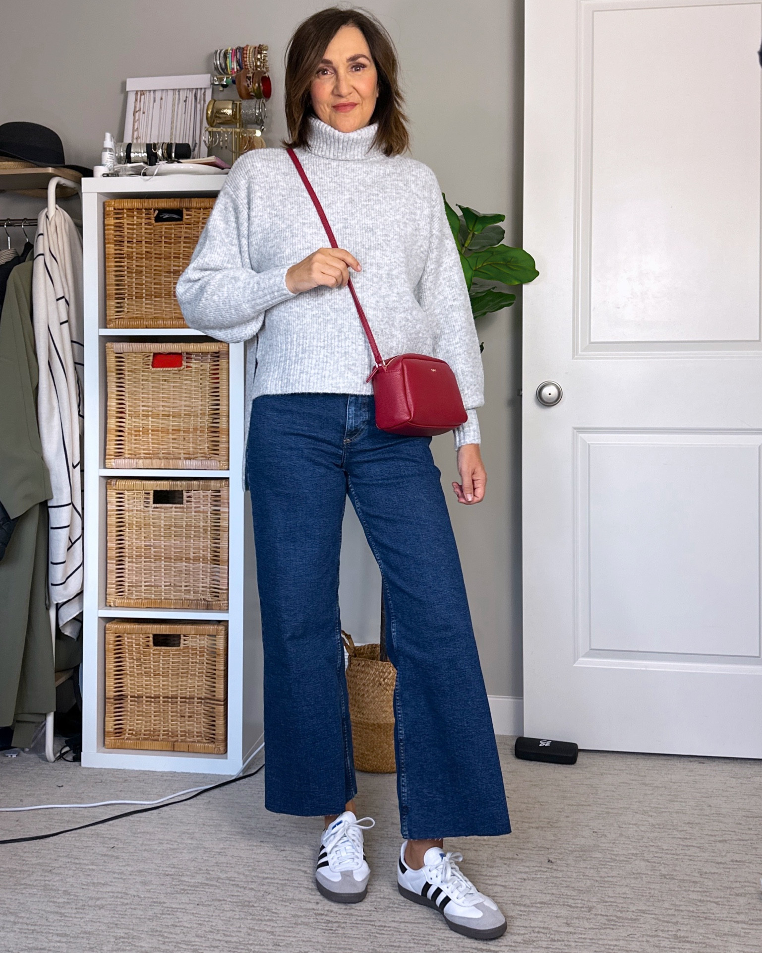 Outfit for a little mall visit, hence no coat!
My sweater is so soft and 40% off! 5% wool but not itchy! I’m in my usual size S. I also linked the matching wide leg knit lounge pants, so cozy, fit tts and 50% off!
My jeans are not on sale but my red bag is, I love the deeper shade of red and it’s a great size for dressier outfits too (has chain on the other side).
There are lots of sizes left of my Sambas on the Canadian Adidas site, very limited on the US site. (For US, try the Amazon link). I’m women’s 7.5 and got men’s 6 which is supposed to be like women’s 7, they got me perfectly!


#LTKCyberWeek #LTKshoecrush #LTKitbag