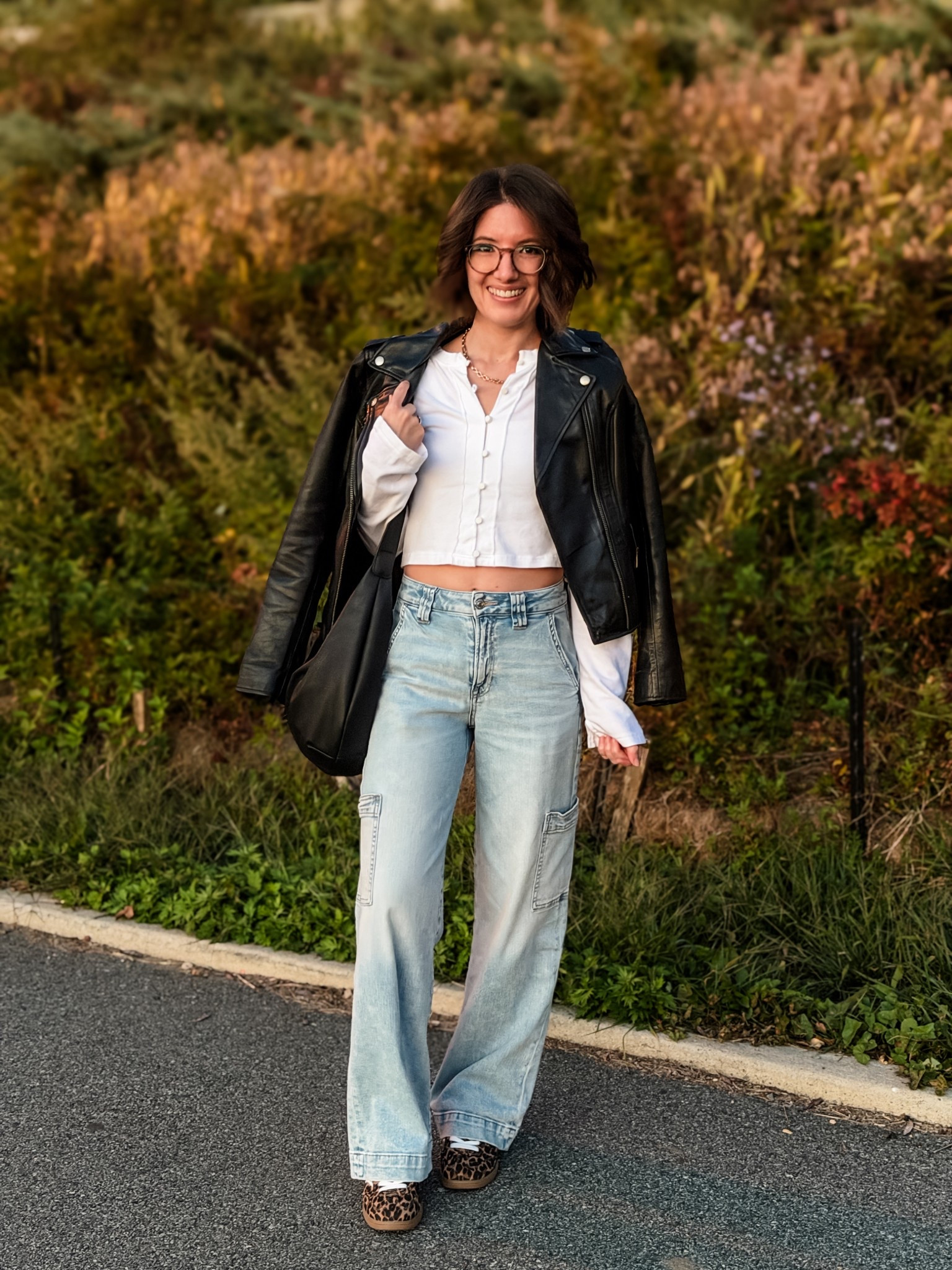 Leather jacket: TTS
Cropped button up tee: TTS
Cargo pants: TTS, also linked similar 
Leopard sneakers: TTS

Date night | leopard sneakers outfit | leather jacket outfit | fall outfit | wide leg jeans outfit 

#LTKStyleTip #LTKSaleAlert #LTKSeasonal