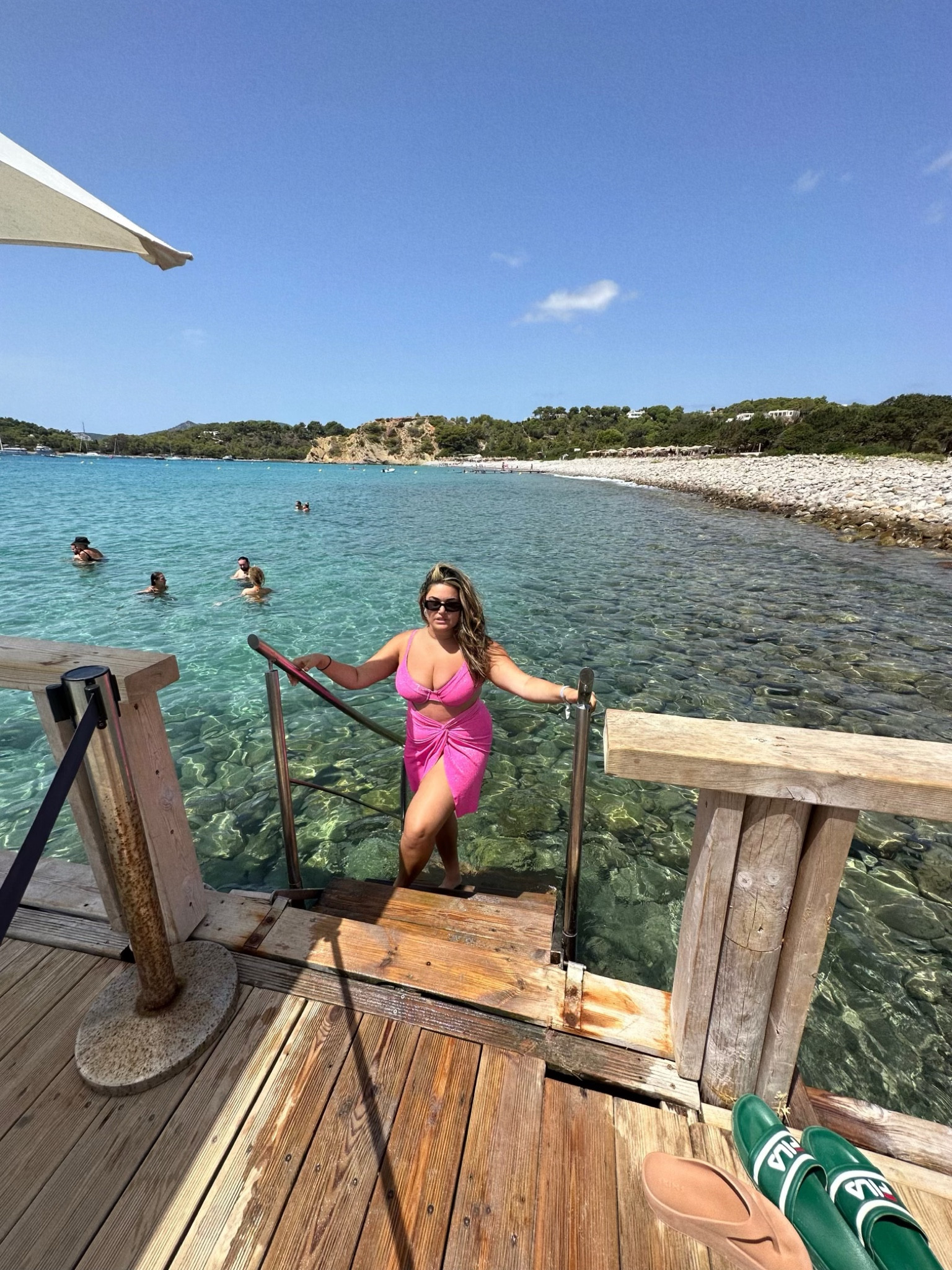 Love this pink sparkle bikini and sarong set! One of my fav vacation looks.

#LTKswim #LTKtravel #LTKstyletip