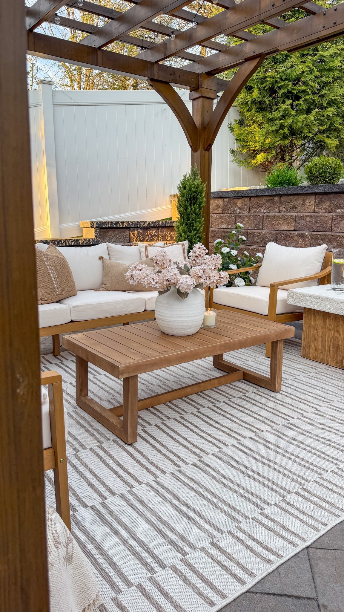 #ad The mix of warm wood tones, soft neutrals, and texture made the biggest difference in bringing out outdoor space to life … especially the rug + these pieces.

One of my gem finds is this @Wayfair coffee table—it has those clean, modern lines that give such a designer feel, and I honestly can’t believe it’s under $175. 🎉

Everything feels elevated but still so cozy, which is exactly what I wanted for this space. 

#wayfair #wayfairpartner #outdoor #wishyouwerehere #coffeetable #acaciawood