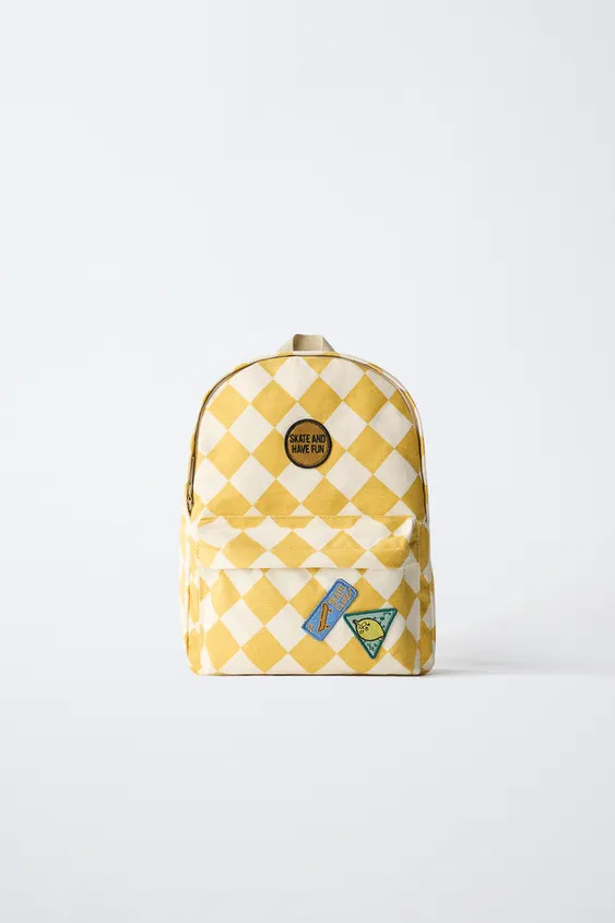 Backpack with a contrast checks print. Main compartment and front pocket with zip fastening. Deco... | Zara UK