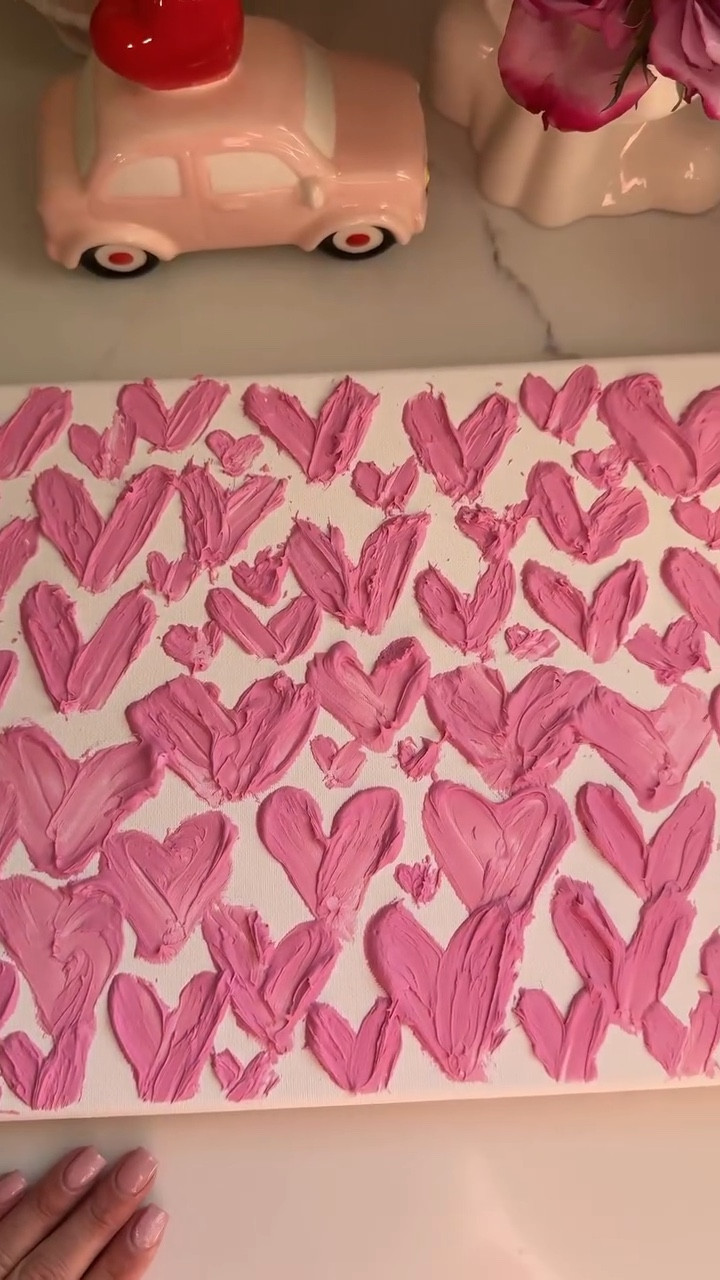 Spackle Hearts 💕 
.
The possibilities are limitless! The girls and I are diving in next. So easy, barely any mess tbh (way better than painting) and endless creativity! . I jazzed up the quick-dry pink spackle with food coloring for that perfect pop of pink since it does dry white normally 
.
. Can’t wait to create more!!! #vdayart #vday2026