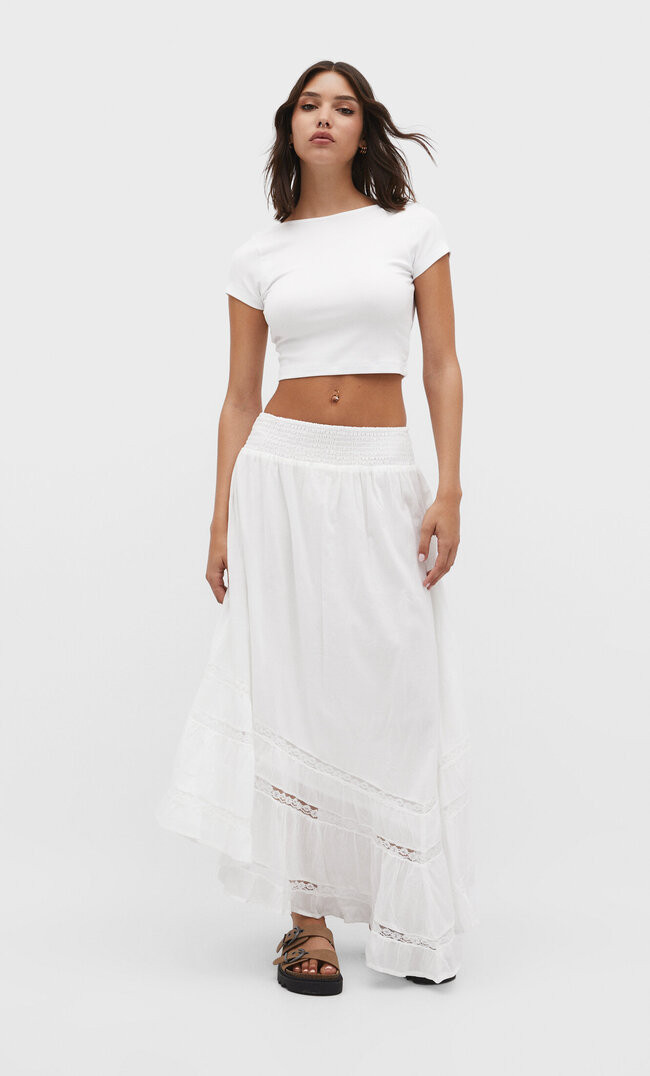 Flowing mini skirt with an asymmetric hem. | Stradivarius (UK)