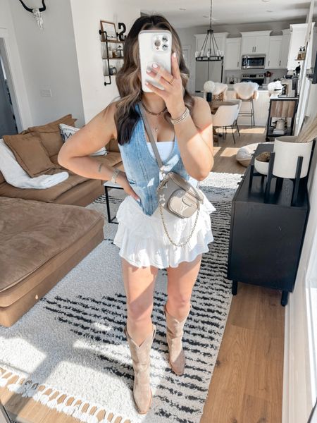 Country Concert Outfit Inspo 🎵🤍

I love this denim & white western look! I’ve been wearing this denim vest on repeat lately — so many ways to style it! Bonus points because this “skirt” is actually a SKORT 👏🏼 also wearing my favorite western boots! 

Tube Top — xs
Denim Vest — medium
Skort — small
*my bag is the grey color option! 

Also linked the shapewear thongs that I LOVE!! They’re the perfect smoothing underwear without feeling too tight or constricting! 

neutral outfit | Nashville outfit | Nashville style | western outfit | western fashion | cowgirl boots | winery outfit 



#LTKFindsUnder50 #LTKShoeCrush #LTKFindsUnder100