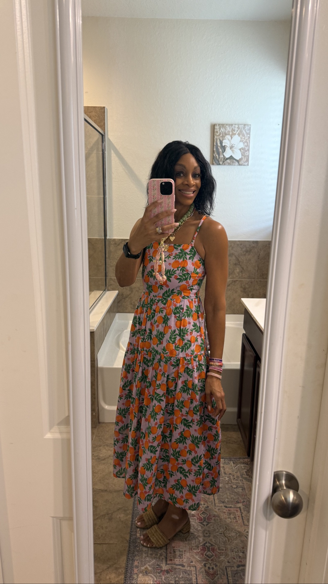 Here’s a short LTK caption that fits this bright, summery look:

🍊 Summer outfit of the day! This citrus-print dress is lightweight, fun, and perfect for everything from brunch to weekend errands. 🍊✨ Shop similar looks and my accessories in my LTK—link in bio! 🤍

#LTKootd #LTKOver40 #LTKPetite