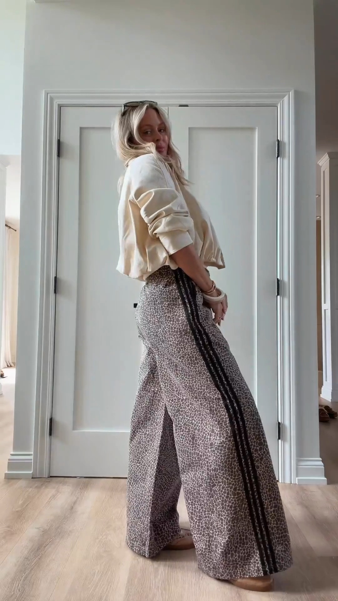 This outfit - sideline chic! I can’t tell you how many ppl stopped me about these pants! They’re roomy, comfy and so fun! 
I’m in all smalls. 

Track pants. Coats. Jackets. Shoes. Sneakers. Spring outfits 2026. Spring. Pants. Sports mom. 

#LTKActive #LTKootd #LTKSeasonal