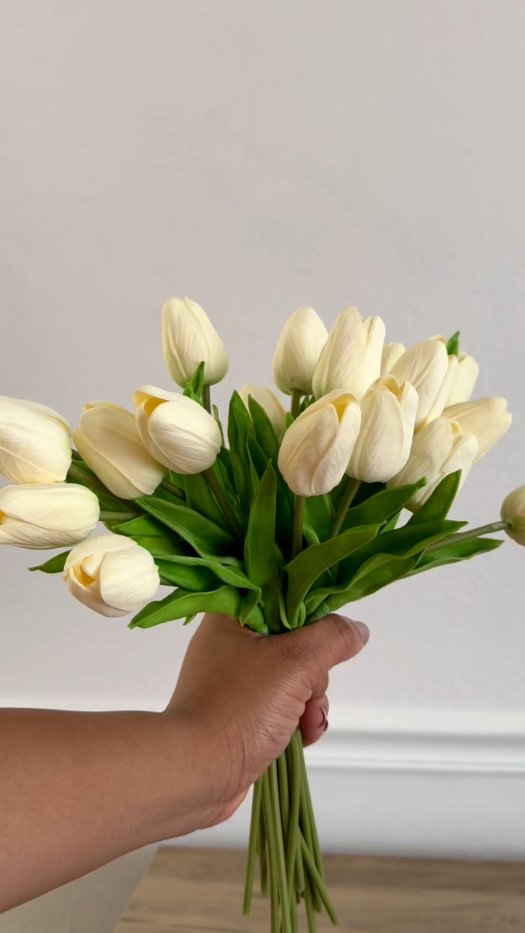 Faux tulips styled for spring! Add a glass vase and home decor books and you have the simple spring look!

#LTKSeasonal #LTKHome