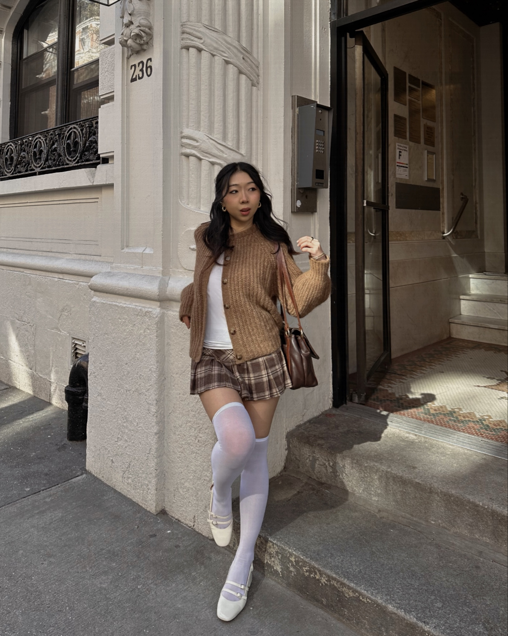 brown tones for spring 🧸 wearing M in the cardigan and S in the skirt!

#LTKstyletip #LTKfindsunder100 #LTKSeasonal