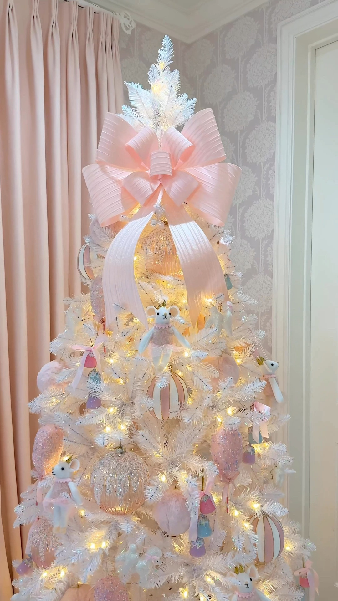 Turning Stella’s corner into a little Sugar Plum Fairy wonderland 💗🍭Daddy may say “no more pink,” but we simply cannot be controlled! At least we went with a white tree, right? Everything is from @AtHomeStores. They have the cutest PINKmas finds every year and so many beautiful shatterproof ornaments (which is key when you have a baby + cats) #AtHomePartner

#pinkmas #christmastree #pinkchristmas #girlmom 

#LTKHoliday #LTKSeasonal #LTKHome