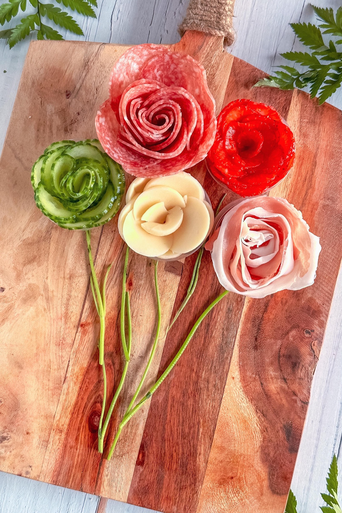 DID YOU KNOW you can create an edible rose out of more than just salami? 🌹 Thin, round slices or moldable slices are the key! Here are a few fun ideas:

1. Use a mandolin to slice cucumbers orother veggies super thin for a fresh twist.
2. Try cold prosciutto for a delicate and savory option.
3. Get creative with strawberries or even mozzarella for a sweet or cheesy touch! 

The possibilities are endless—what will you try next? Let me know in the comments! 

#charcuterieandthings #foodstyling #edibleflowers #cheese #charcuterieboard #diyfood

#LTKSeasonal #LTKParties #LTKHome