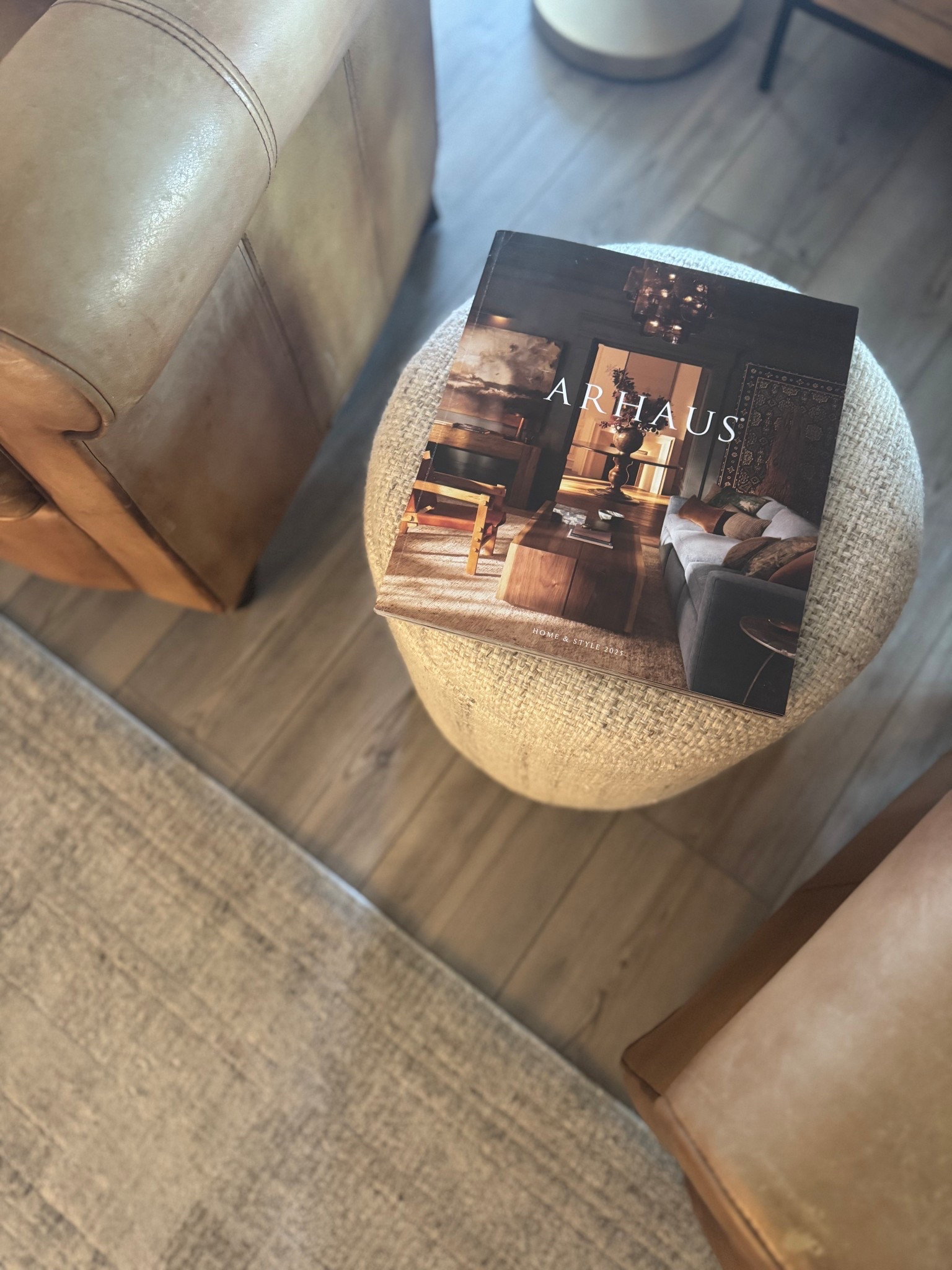 This little storage ottoman ended up being one of those sneaky-good living room finds.

I grabbed it because the plaid pattern ties in perfectly with my rug, but I love that it works overtime — it can be a footrest, a flat-top drink holder, or extra surface space when we’re using multiple seating areas.

The neutral tones work really well with my brown leather chairs, and the scale is perfect for filling a gap without overwhelming the room.
Linked here if you’re looking for a flexible, low-profile living room piece.

#LTKHome
