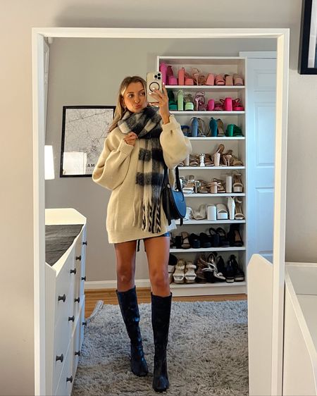 Winter outfit idea styling sweater, skirt, and boots with a chunky scarf 

Code Q4mckenz15 for 15% off 