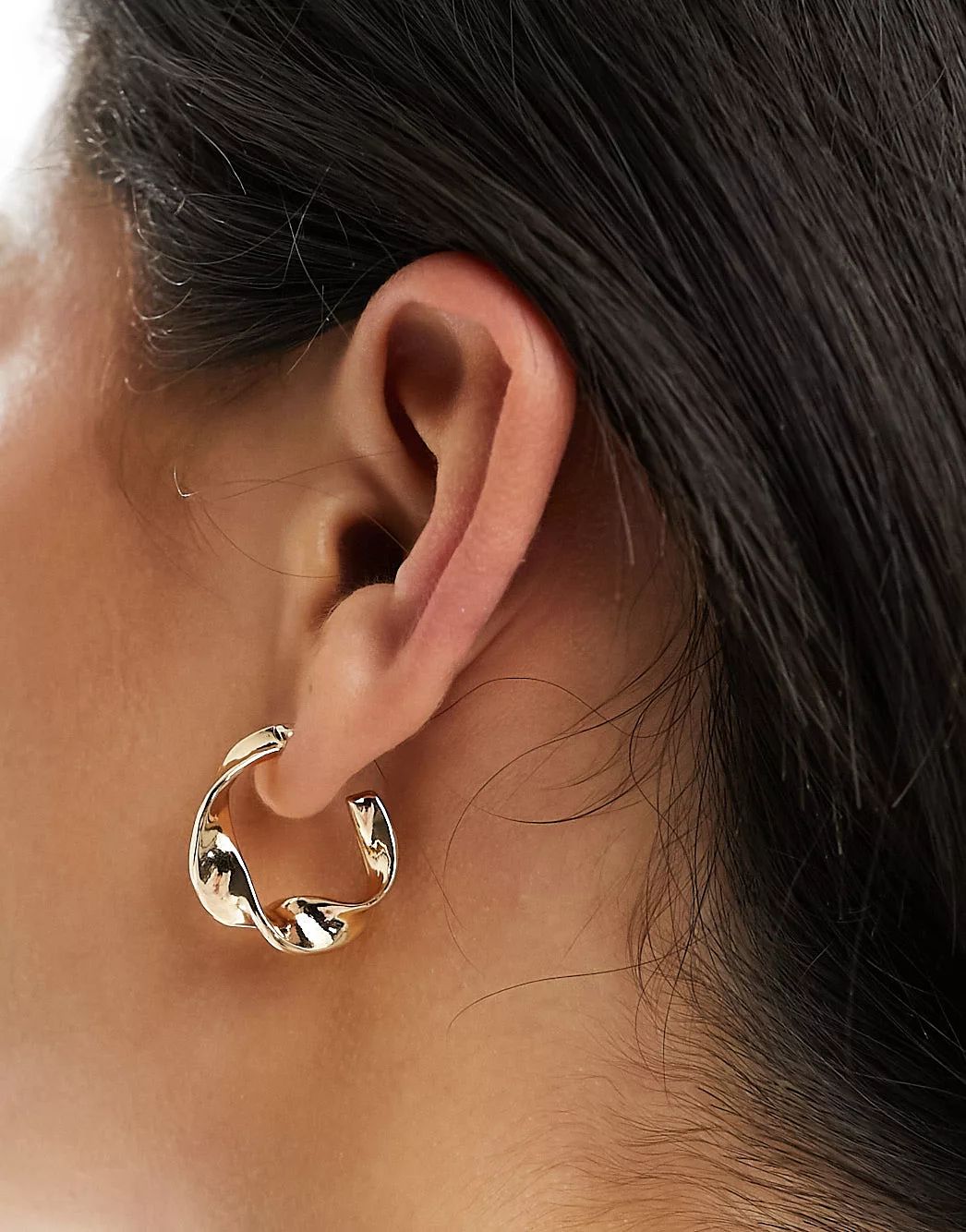 ASOS DESIGN hoop earrings with flat twist design in gold tone | ASOS (Global)