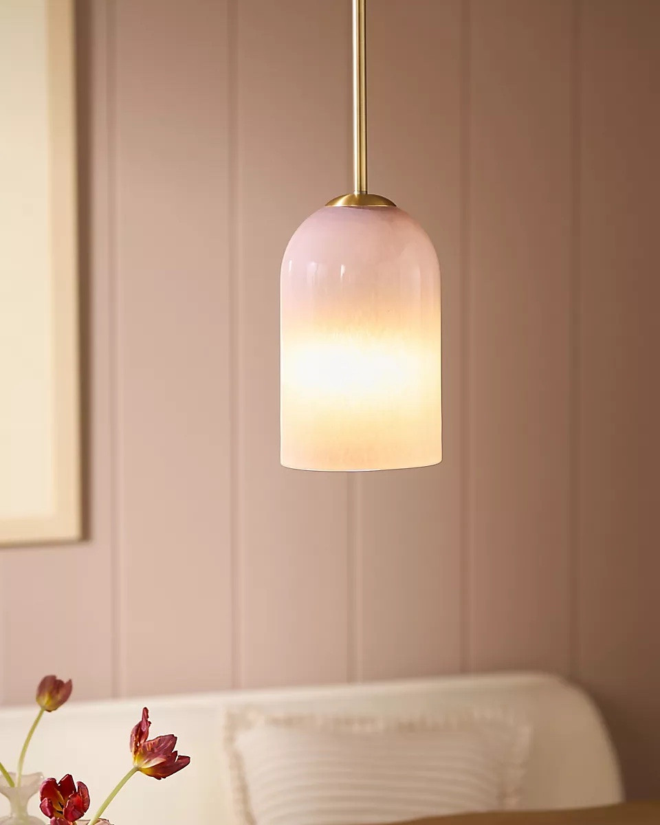 this pendant lamp features a hand-blown glass shade in soft taupe that diffuses the light for a soft, welcoming glow. 

#LTKHome #LTKSeasonal
