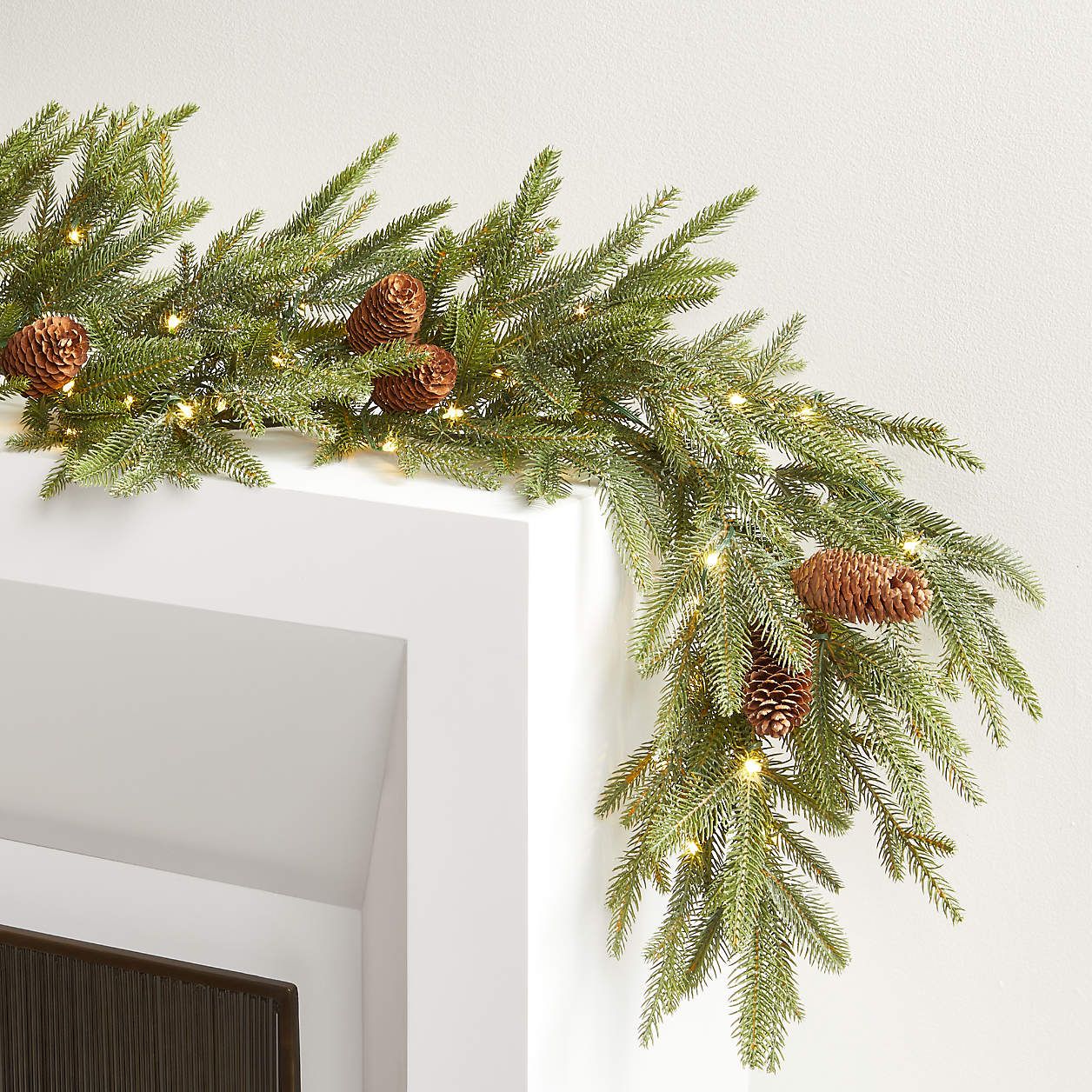 Faux Norway Spruce Pre-Lit LED Garland 6' + Reviews | Crate & Barrel | Crate & Barrel