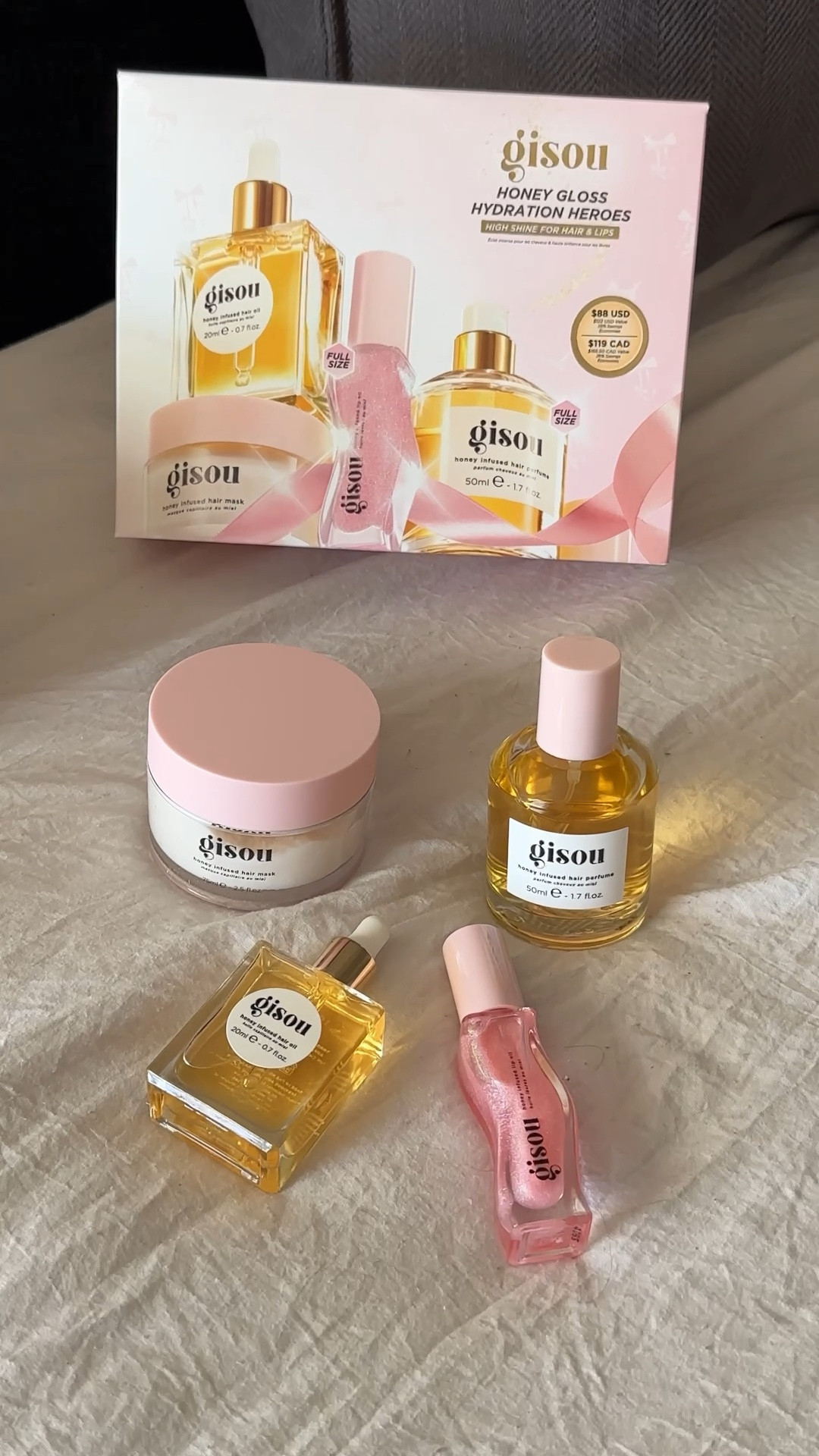 Gisou honey gloss hydration heroes gift set. The perfect gift for the it girl in your life this holiday season. It comes with a watermelon scented lip oil, hair oil, hair perfume, and a hair mask  

#LTKBeauty #LTKFindsUnder100 #LTKGiftGuide