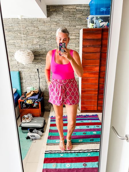 Outfits of the week. Bright pink tank top over a printed short. Lavender bikini and Ipanema sandals. 



#LTKtravel #LTKswim #LTKeurope