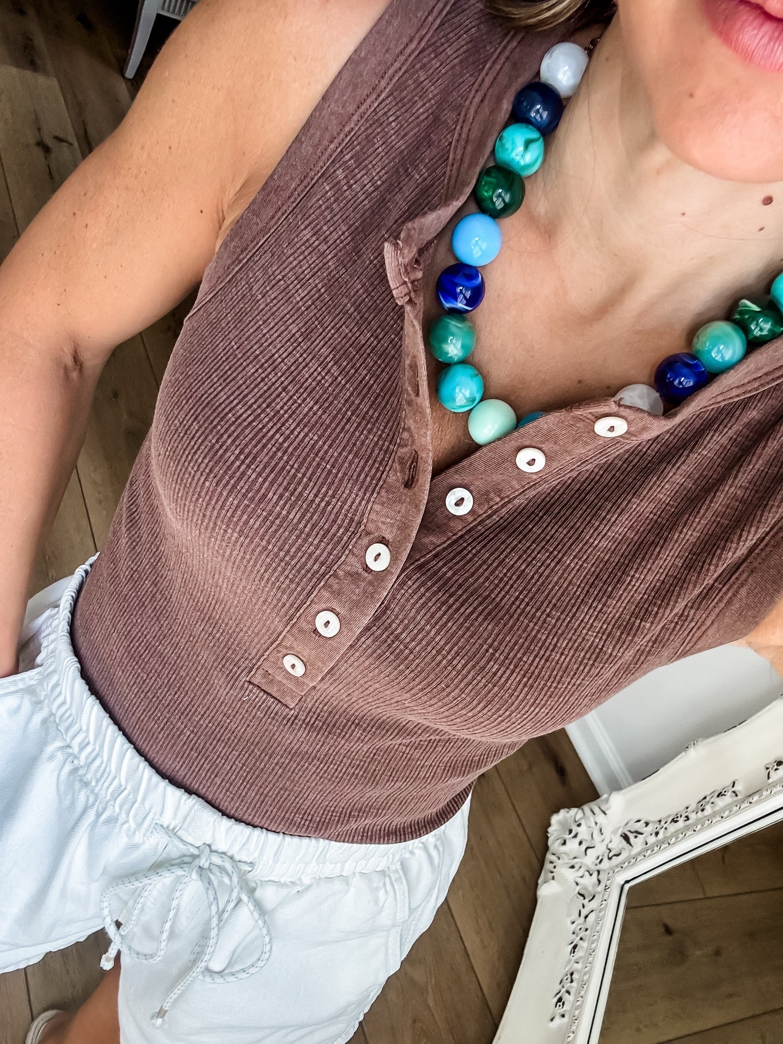 Small Henley tank top. Beaded necklace. Small white denim shorts. 
Target style

#LTKSaleAlert #LTKOver40