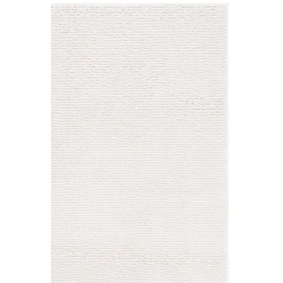 Autin Solid Color Machine Woven Polyester Area Rug in Ivory | Wayfair North America