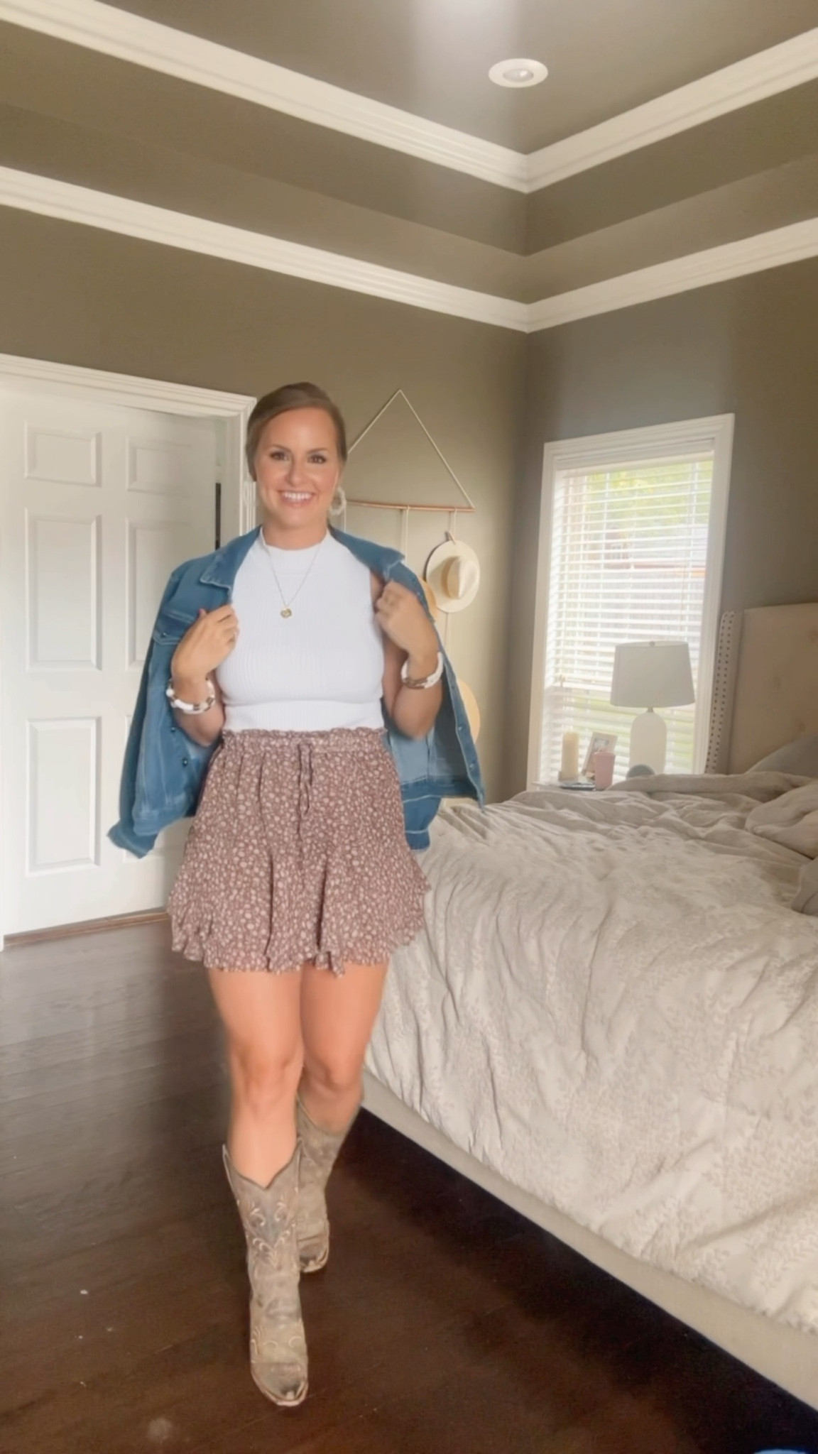 Get ready with me to go to a country concert! Here is a fun country concert outfit you can copy. Love this Floral squirt and white rib tank with mock neck line. Paired it with a denim jacket, gold, necklace, hoop, earrings, and a pair of cowboy boots. 👢 

Country concert outfit.  Get ready with me for tim McGraw! Size 6 fashion. Mom style. Casual mama style. Millennial fashion trends

#LTKMidsize #LTKFindsUnder100 #LTKFindsUnder50