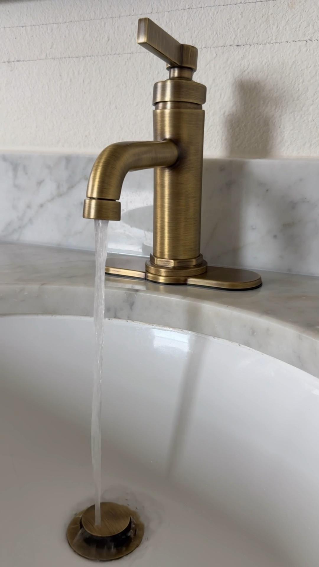 My new single hole bathroom sink faucet with the escutcheon plate is a beautiful solution when I don’t want a centerset and the holes are too close together for a widespread faucet.

It comes in multiple finishes!

Aged brass faucet, signature hardware

#LTKHome