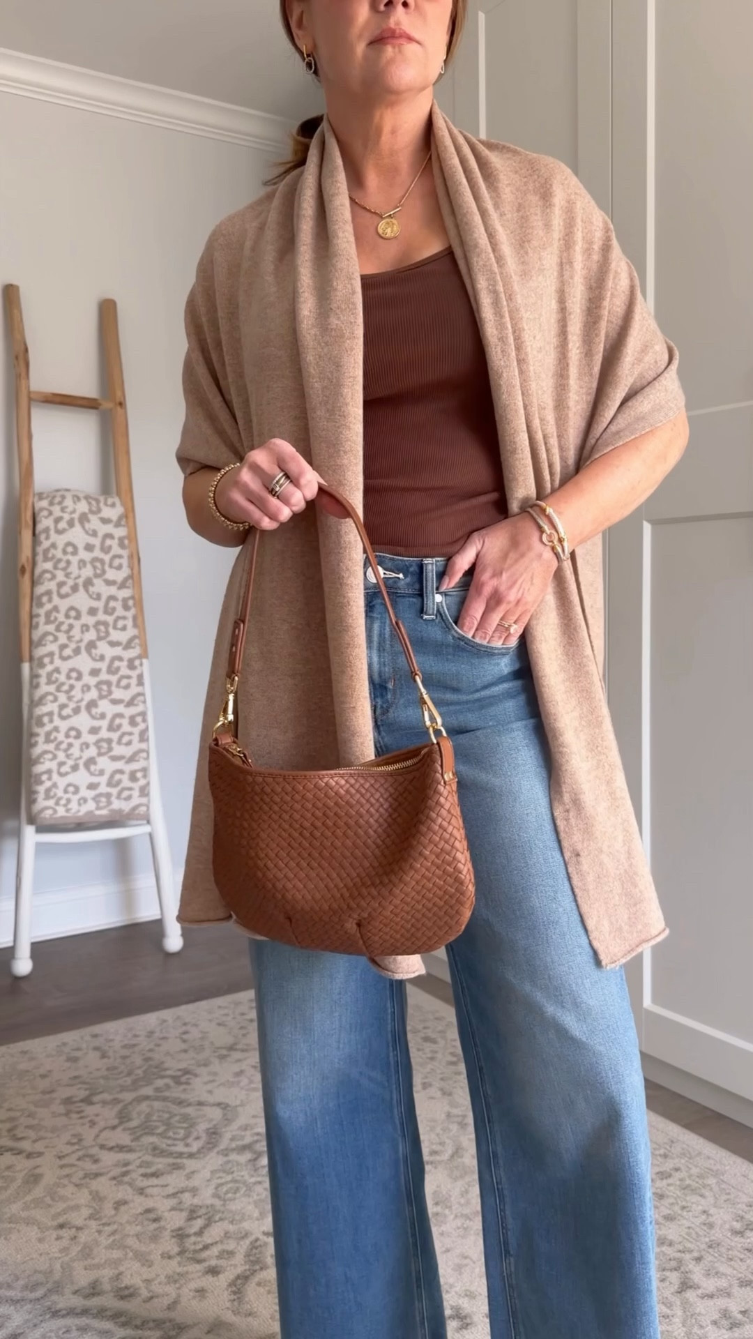 This outfit is chock full of neutral basics I’ll be mixing into outfits all season.
Jeans: $50 look for less for the $249 Paige Annessa jeans ✔️
Ribbed tank: Classic cotton base layer that pairs with anything and everything ✔️
Cashmere wrap: year round staple that doubles as a blanket✔️
Leopard sandals: comfier and cuter than Birks and the perfect pop of print✔️

Classic and timeless style, capsule wardrobe, over 40 style, the most flattering jeans, wardrobe staples
#styleover40 #effortlessstyle #howtostyle 

#LTKootd #LTKSeasonal #LTKOver40