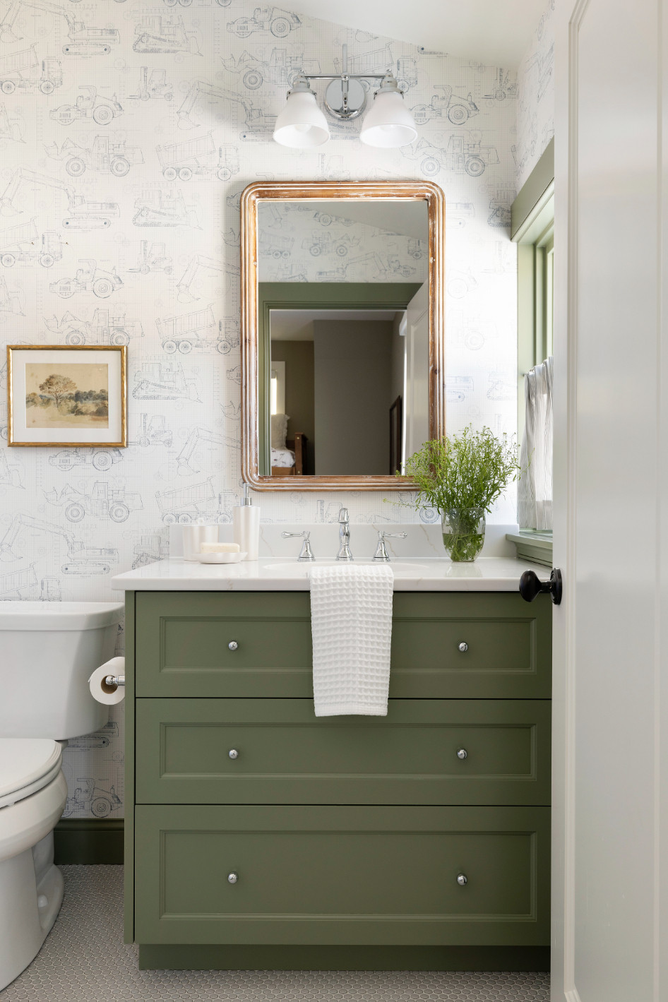 Designing for kids’ spaces is always a favorite, and this boys' bath from our Minnetrista project is no exception! A pop of green on the vanity and shower tiles paired with a playful yet timeless wallpaper makes this space both fun and functional. 

 #LTKHome #LTKKids