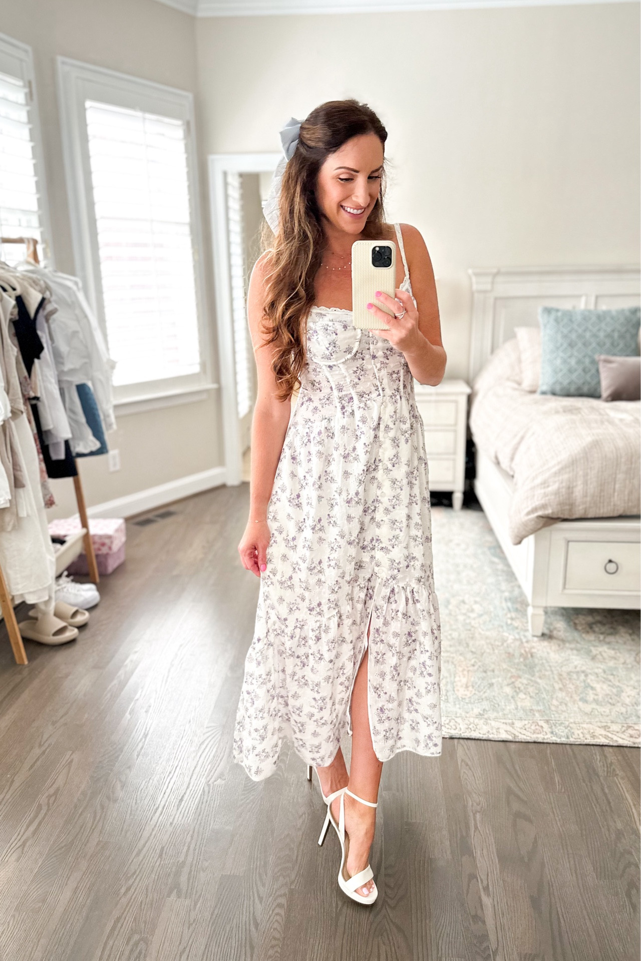 A flirty floral midi corset dress topped with a bow and finished with white strappy heels. 💜

#LTKOver40 #LTKShoeCrush #LTKWedding