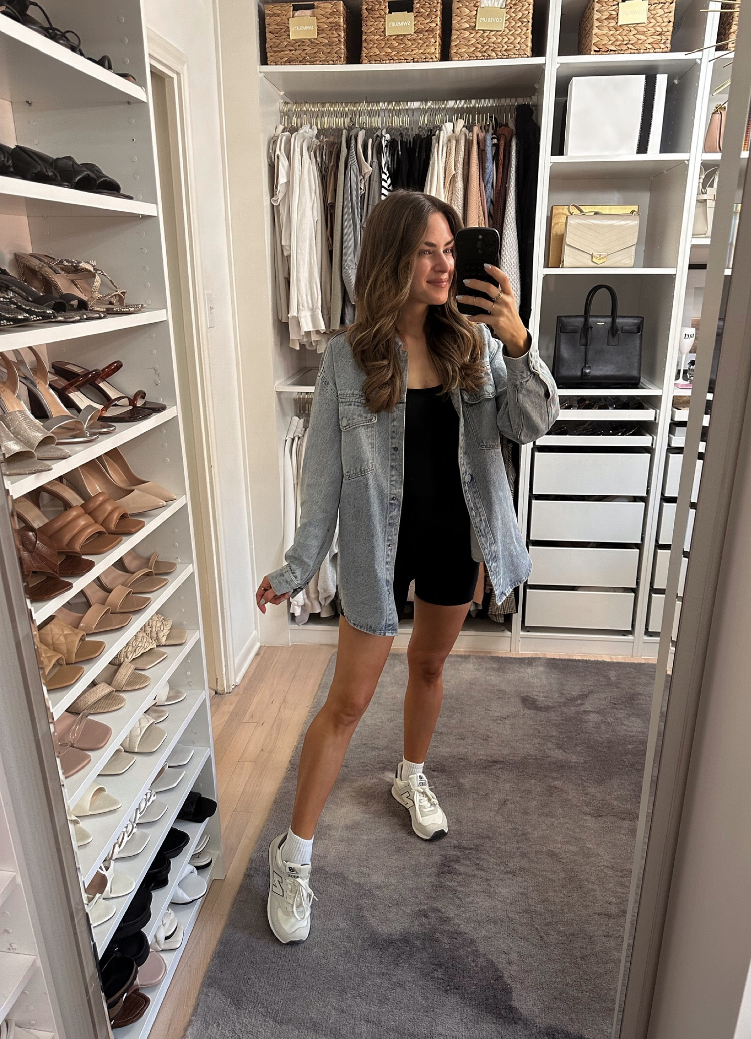 Absolutely obsessed with this cute romper! I’m wearing it in a size S. Such a great casual weekend outfit. My sneakers run TTS. // Abercrombie, AF outfit, spring outfit, black romper, denim shacket 