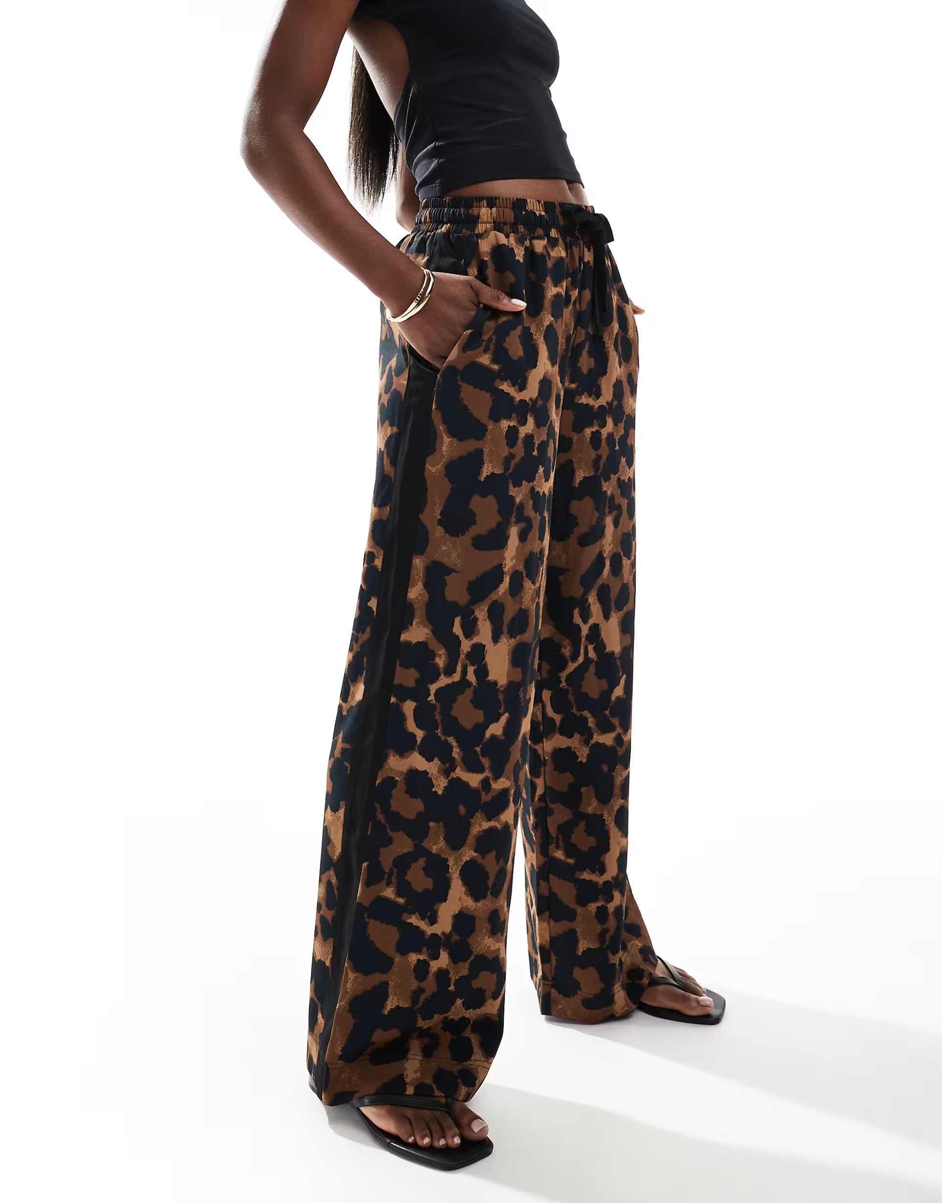 ASOS DESIGN pull on trouser with contrast panel in leopard print | ASOS (Global)