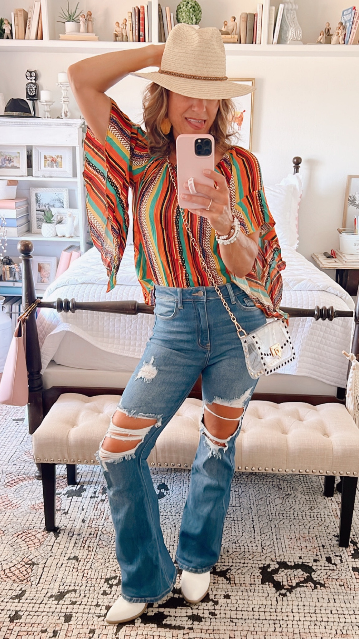 Versatile and fun, this flowy stripe top goes anywhere. Jeans are 🫰high waisted, soft, and so flattering. Boots come in black or white. Everything fits TTS THE BAG YOU NEED this summer for concerts and all venues. Shop on my links 

#LTKstyletip #LTKshoecrush #LTKFind