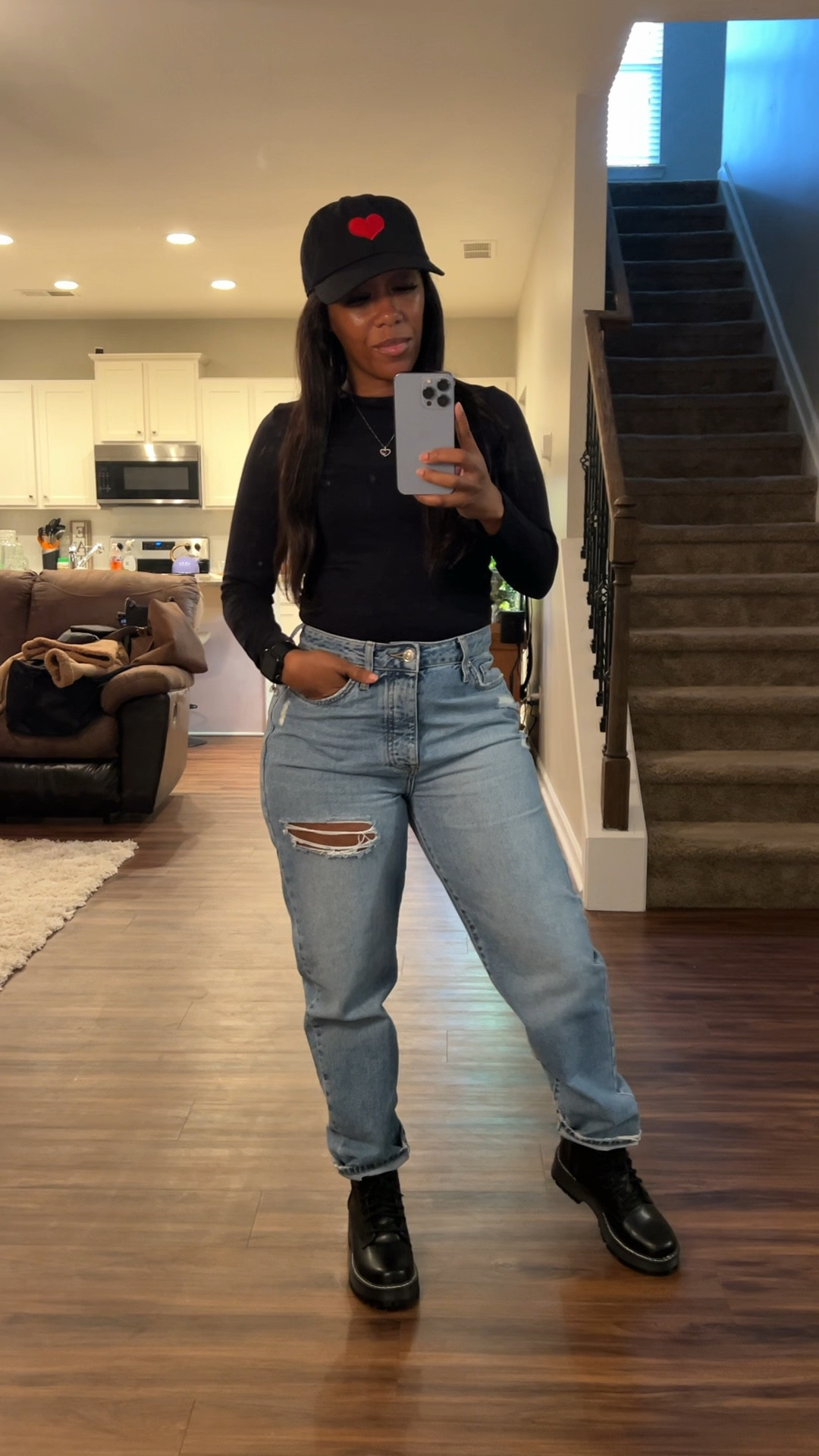 How to style a black long sleeve shirt with jeans, a black hat, and black boots

#LTKShoeCrush #LTKFindsUnder100 #LTKStyleTip