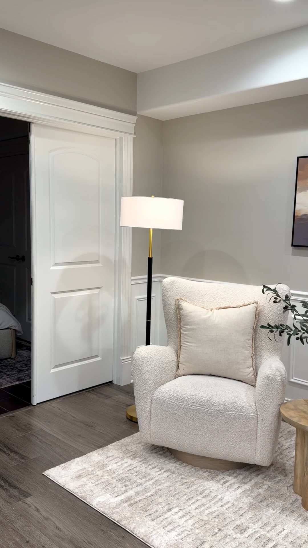 One of the most asked-about corners in our basement ✨

The best part? Everything you see here is from Amazon except the chairs. Linked the rug, artwork, lamp, side table, vase, stems, and throw blanket that helped create this cozy reading nook.

Small details really do make the biggest difference.

#LTKHome