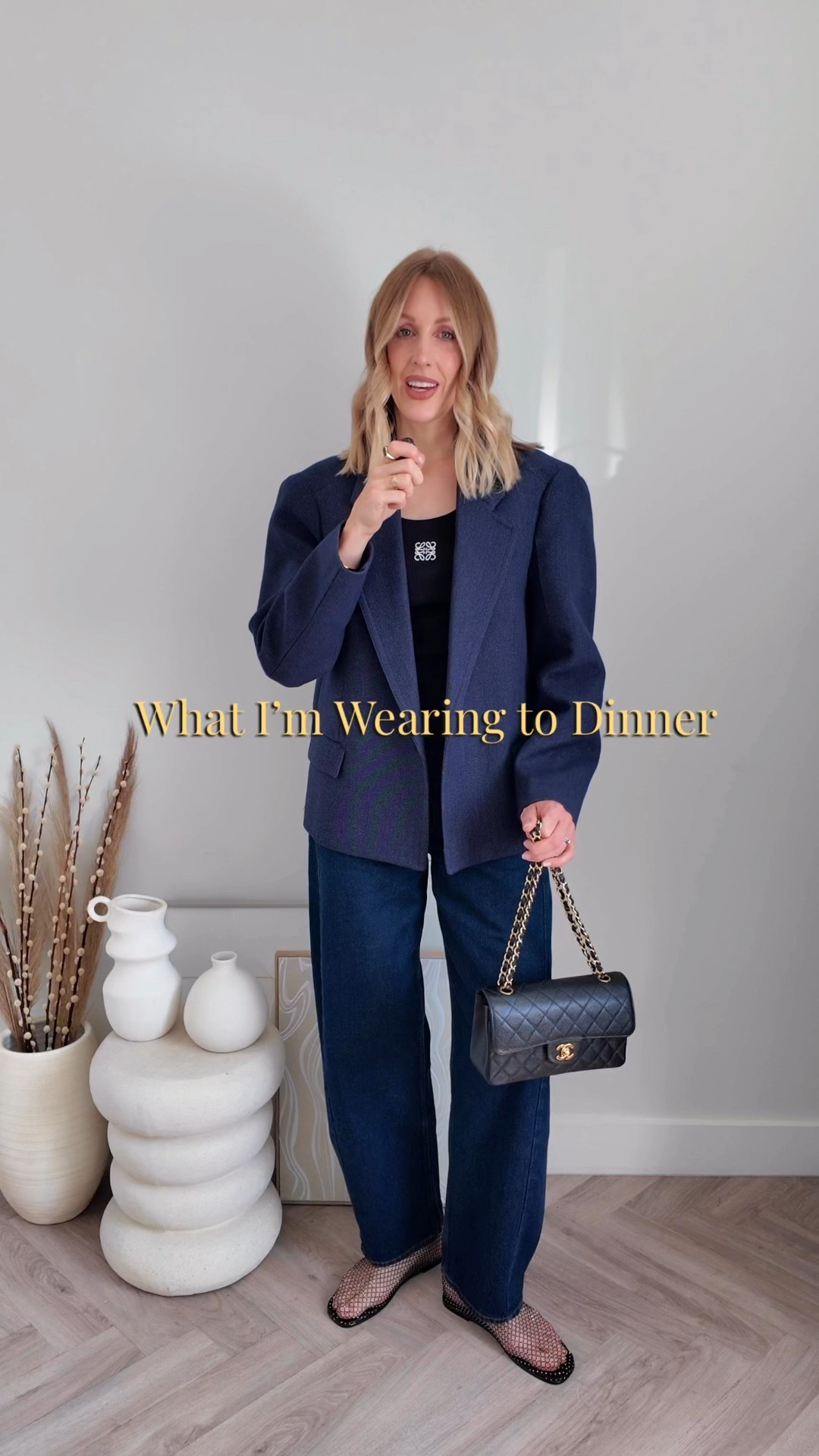 This comfy chic outfit formula never fails me! Perfect for dinner when you want to feel put-together without overthinking it. 

Style Tip: Keep it to 3 colours + modern cuts (like barrel-leg jeans + an oversized blazer) for a look that’s classic and current.

Cos blazer - barrel jeans - vintage Chanel bag - Loewe vest top - logo vest top - rhinestone flats - mesh sandals - mesh flats - trendy shoes - dinner outfit - date outfit - blue blazer 

#LTKstyletip #LTKuk #LTKluxury