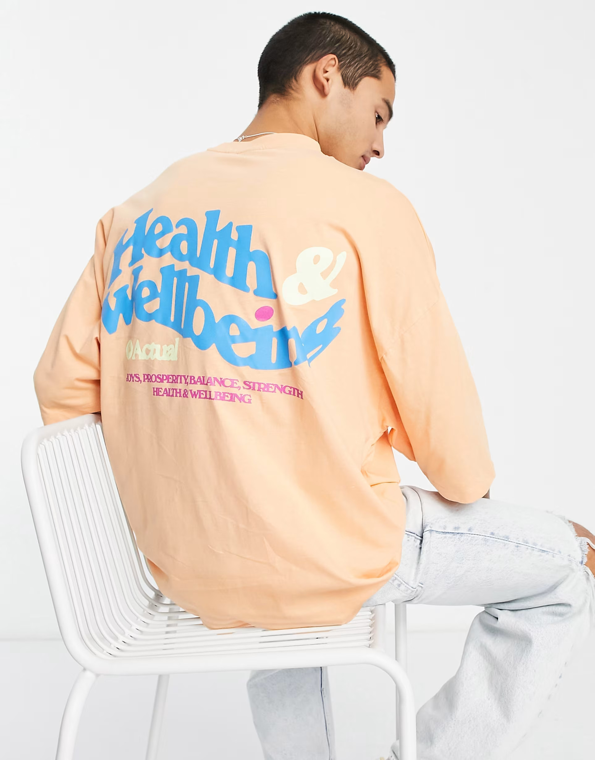 ASOS Actual oversized t-shirt with health & wellbeing back print logo in orange | ASOS (Global)