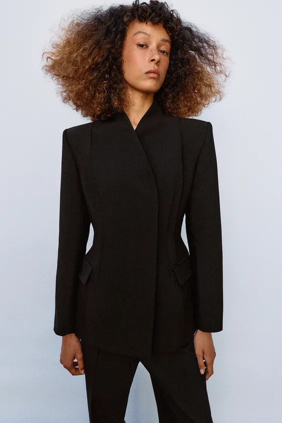 DescriptionCompositionMeasurementsModel height: 179 cmZARA WOMAN COLLECTIONAsymmetric blazer with... | Zara AU