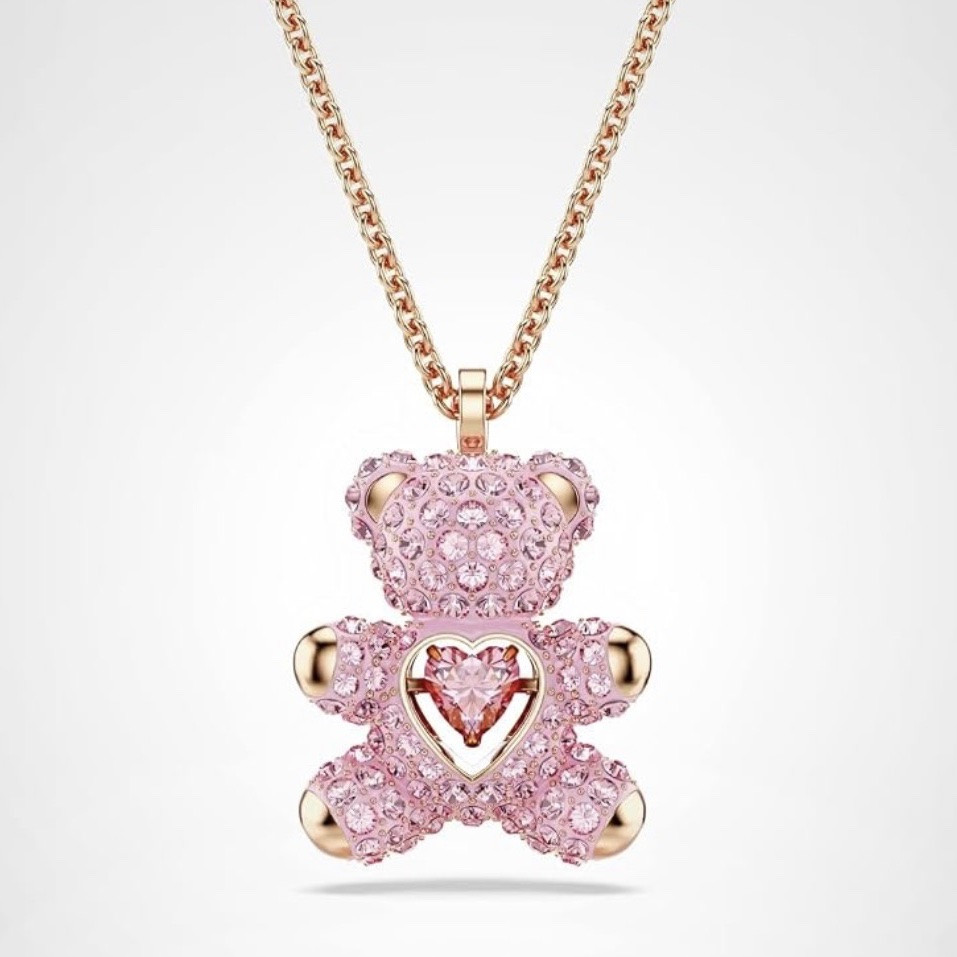 Swarovski Teddy Bear Pendant Necklace, Pink Crystals, Rose Gold-Tone Finish

The 3D teddy is covered in light pink crystal Pointiage and holds a heart-shaped 'dancing' stone in a vibrant pink shade

#LTKootd #LTKTravel #LTKWorkwear