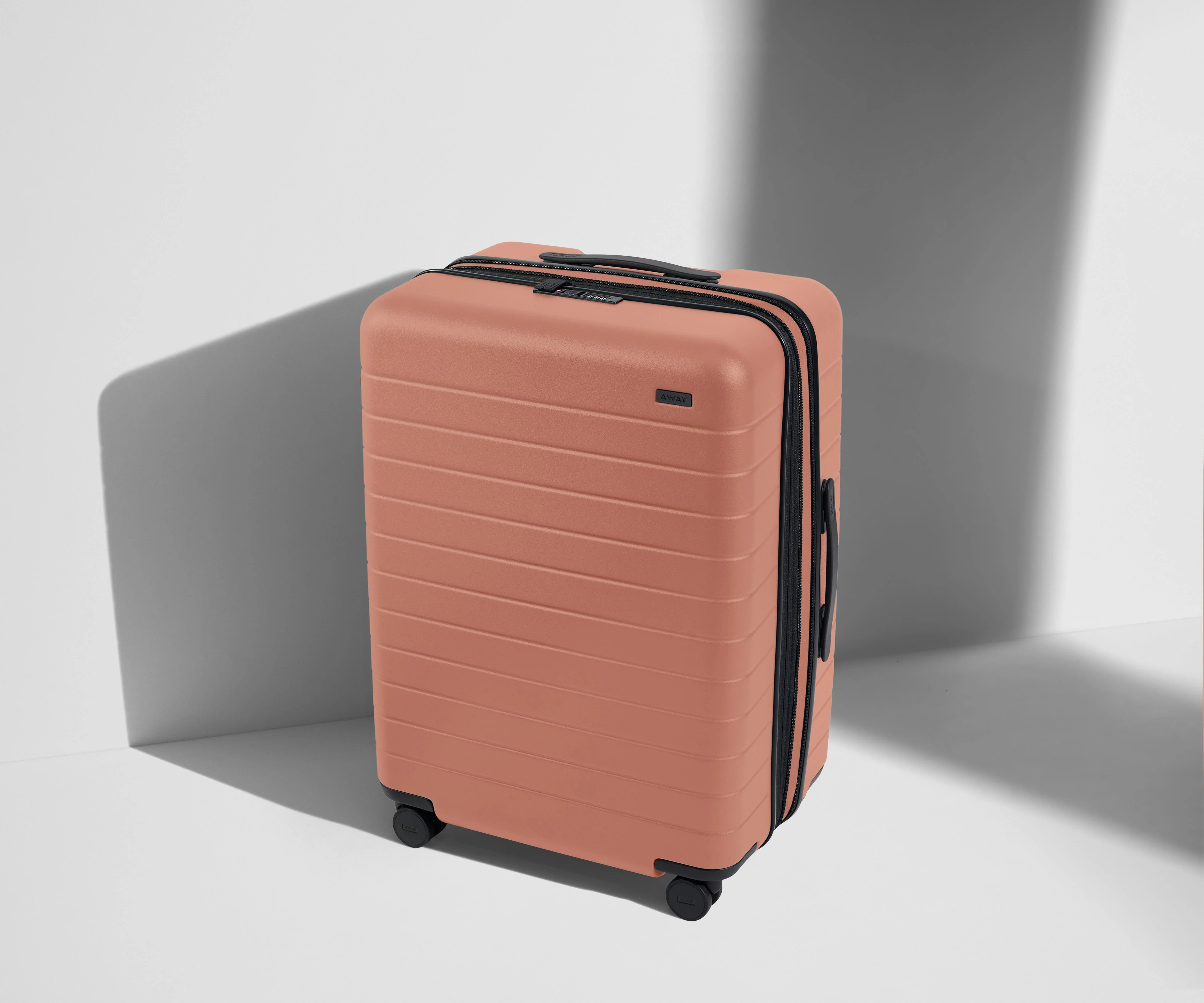 Expandable Medium Suitcases: Clay Pink | Away | Away