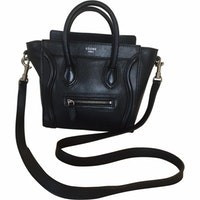 Luggage shoulder bag in leather. | Vestiaire Collective US